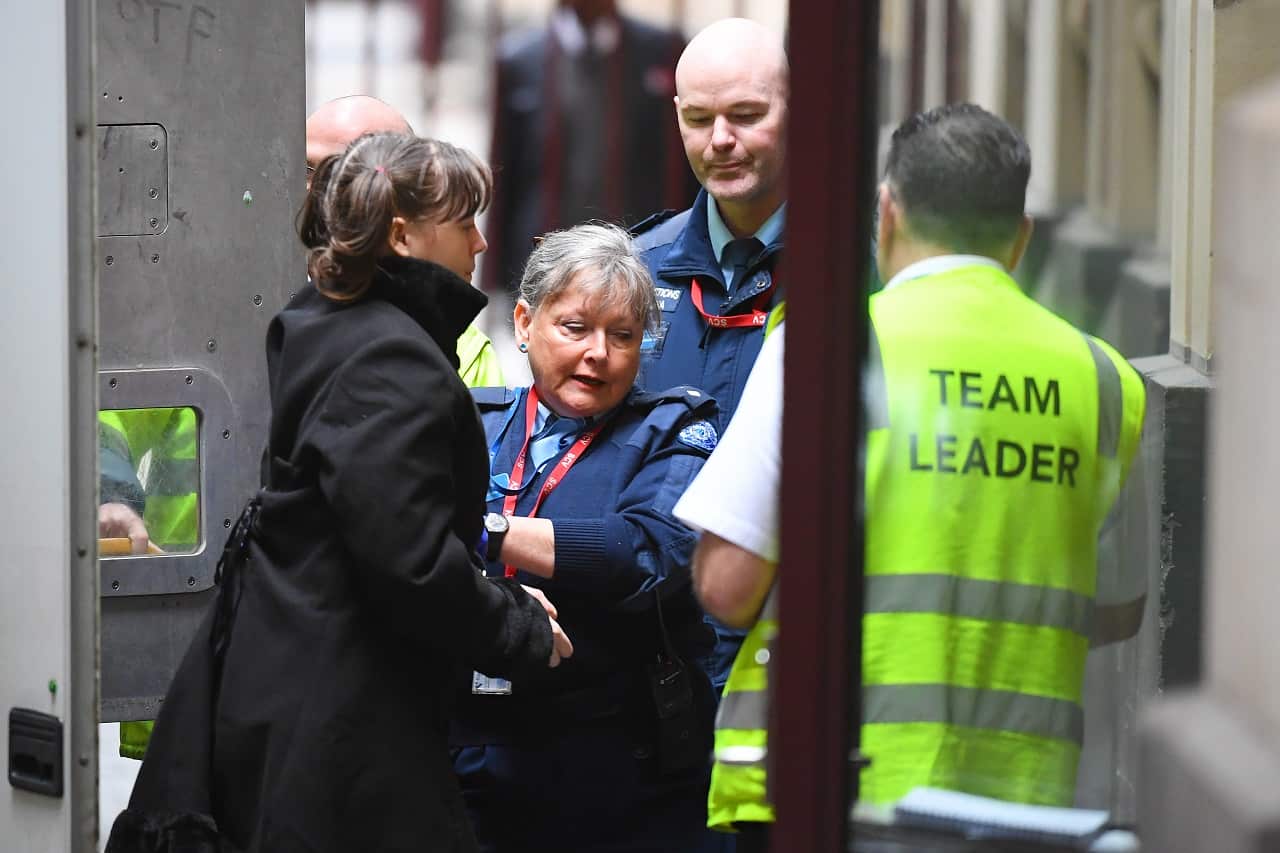 Jamie Lee Dolheguy (left) arrives to the Supreme Court of Victoria, Melbourne, April 17, 2020.