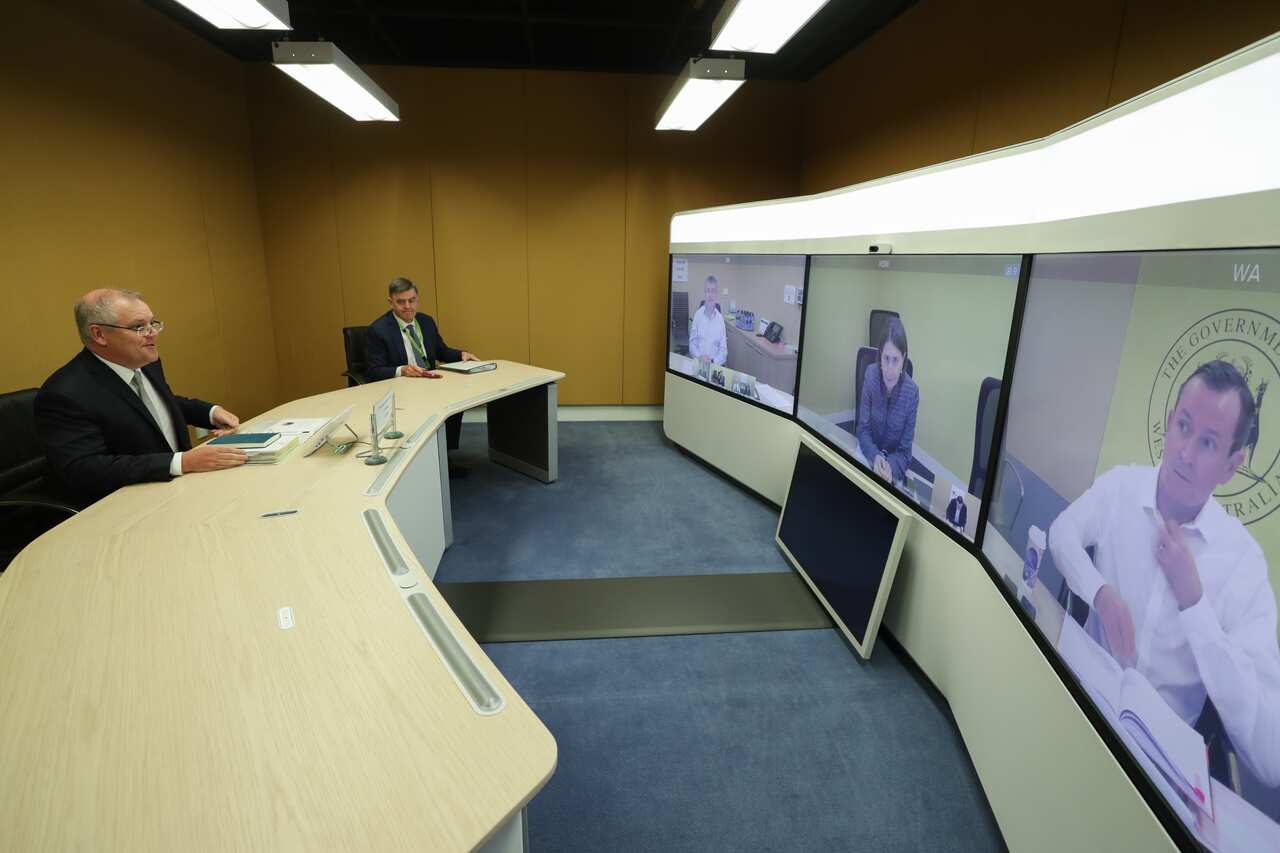 Prime Minister Scott Morrison and Chief Medical Officer Professor Brendan Murphy speak with (on screen) Jim McDowell, Chief Executive of the South Australia Department of Premier and Cabinet, Premier of NSW Gladys Berejiklian and Premier of Western Austra
