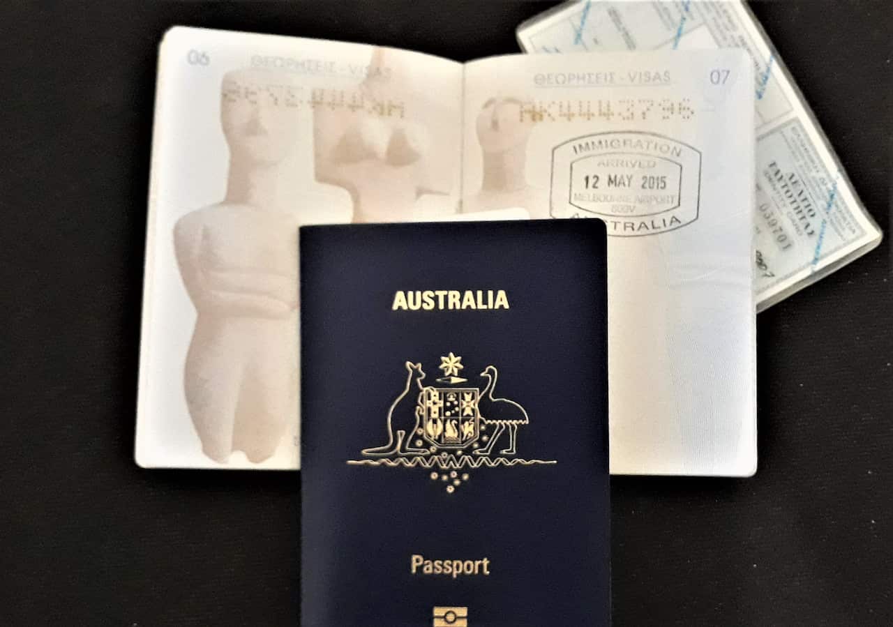 A Greek and an Australian passport and a Greek ID. 