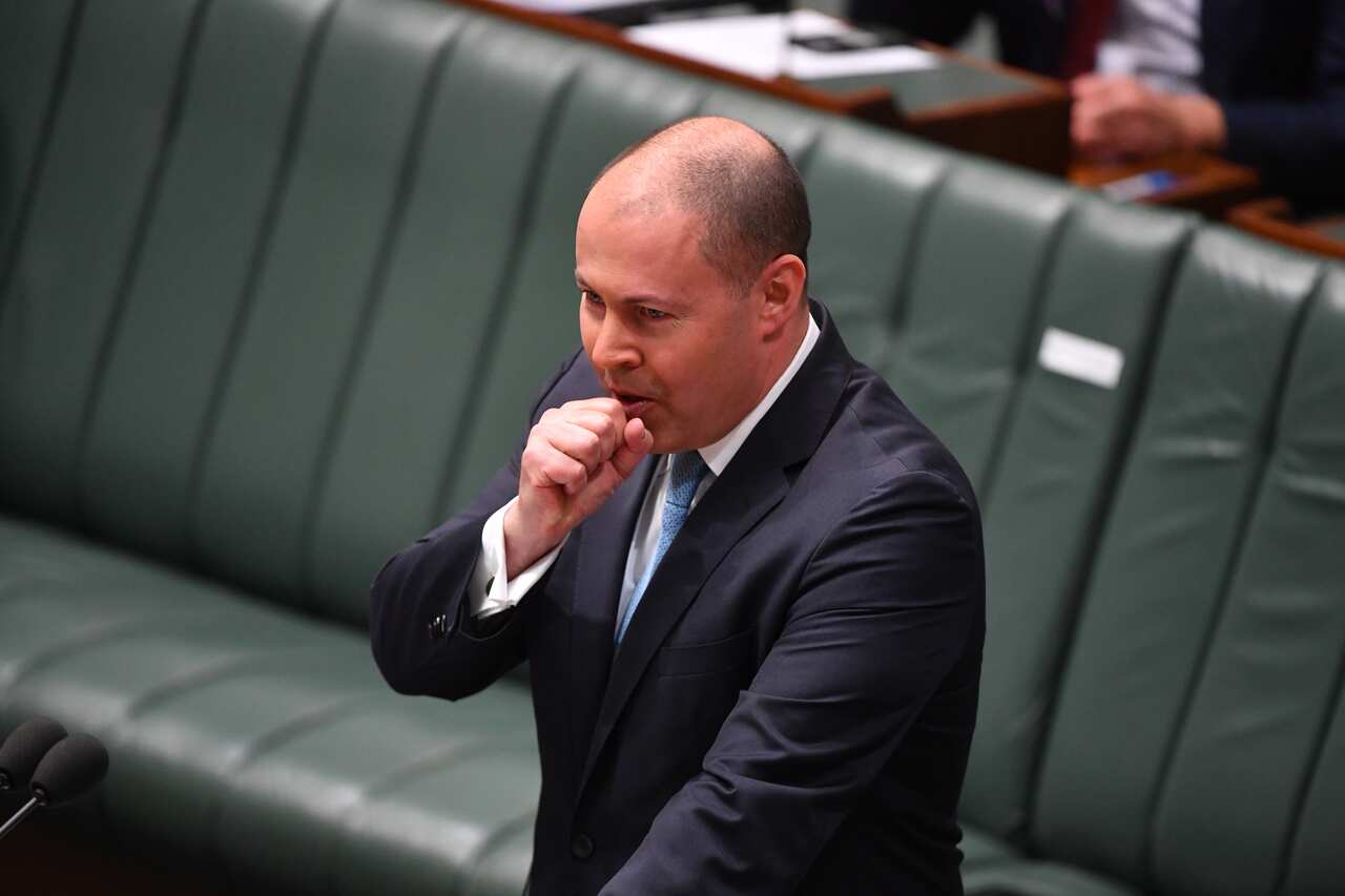 Treasurer Josh Frydenberg has a coughing fit as he makes a ministerial statement to the House of Representatives at Parliament House in Canberra, Tuesday, May 12, 2020. (AAP Image/Mick Tsikas) NO ARCHIVING