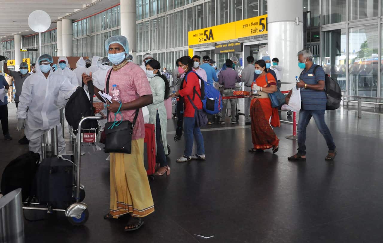 Indian stranded in Dhaka arrived at special flight Vande Bharat at NSCBI Airport during nation wide lock down 4 imposed in the wake of COVID 19 Coronavirus pandemic in Kolkata, India on May 18, 2020. (Photo by Saikat Paul/Pacific Press/Sipa USA)