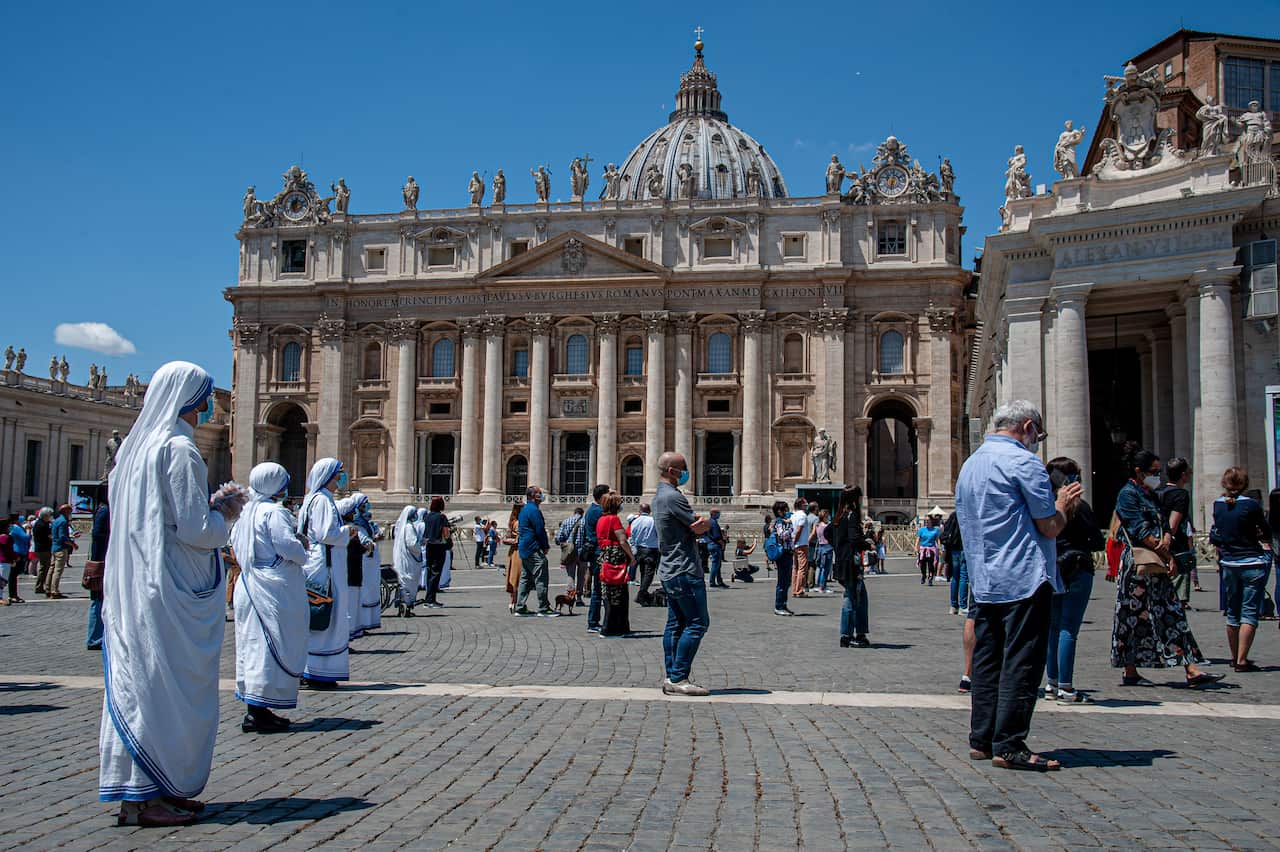 Missionary Sisters of Charity participate and pray during the Angelus noon prayer, in St. Peter's Square, at the Vatican..