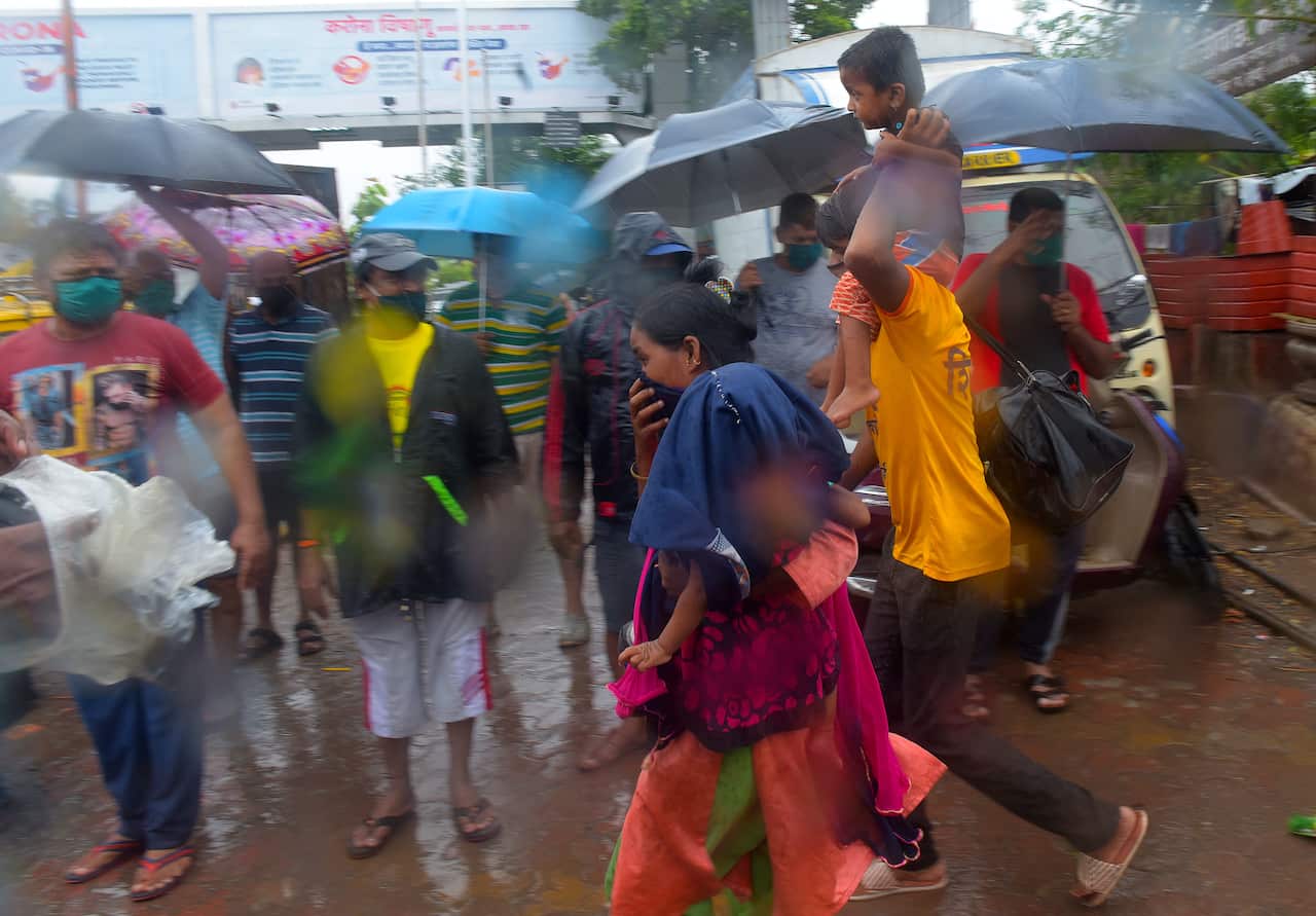 Residence of pattharwadi near mahim Koliwada sea shore shifted to New BMC School mahim due to Nisarga cyclone on June 3, 2020 in Mumbai, India.=