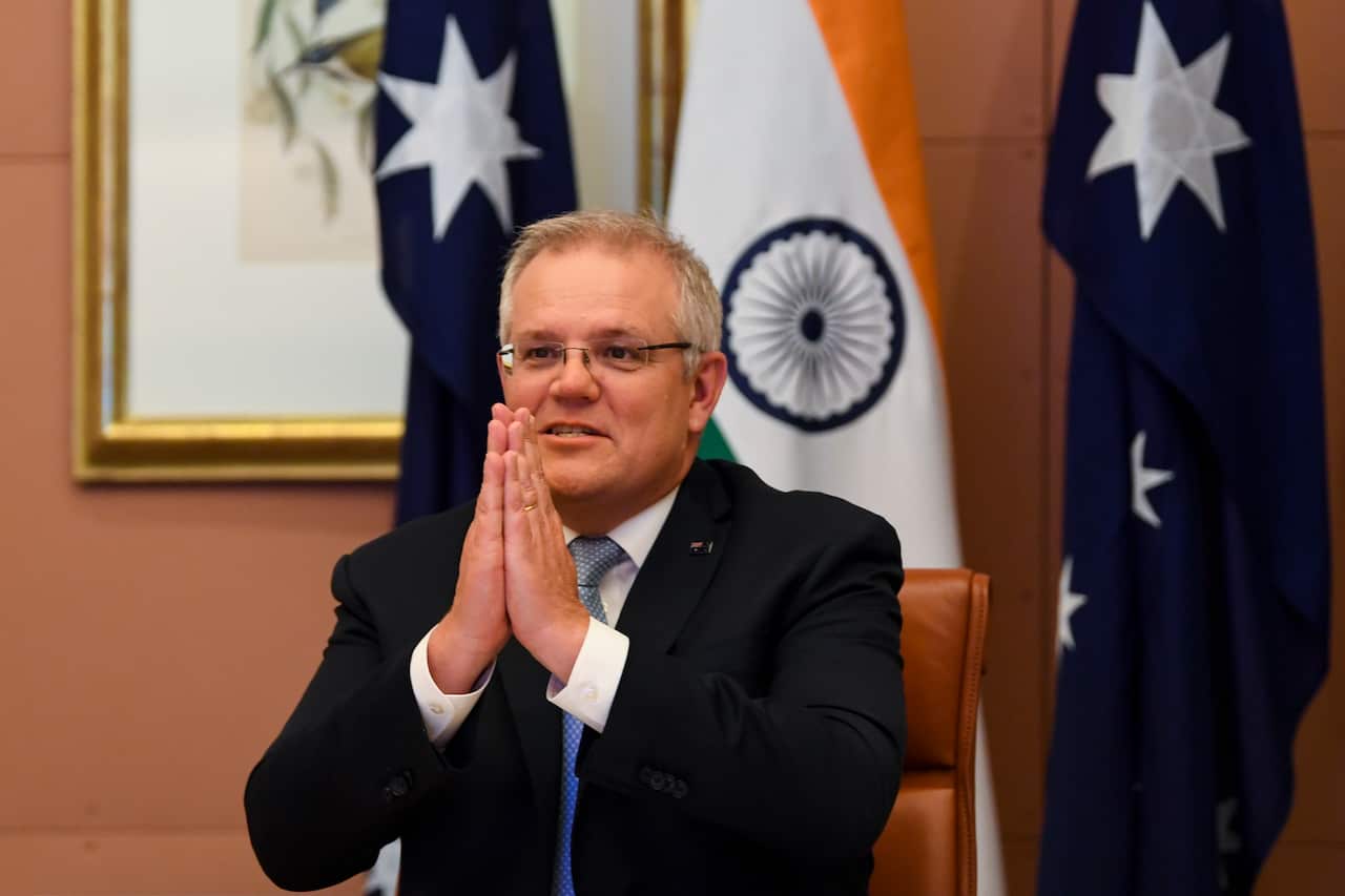 Australian Prime Minister Scott Morrison speaks to Indian Prime Minister Narendra Modi during the 2020 Virtual Leaders Summit between Australia and India at Parliament House in Canberra, Thursday, June 4, 2020. (AAP Image/Lukas Coch) NO ARCHIVING