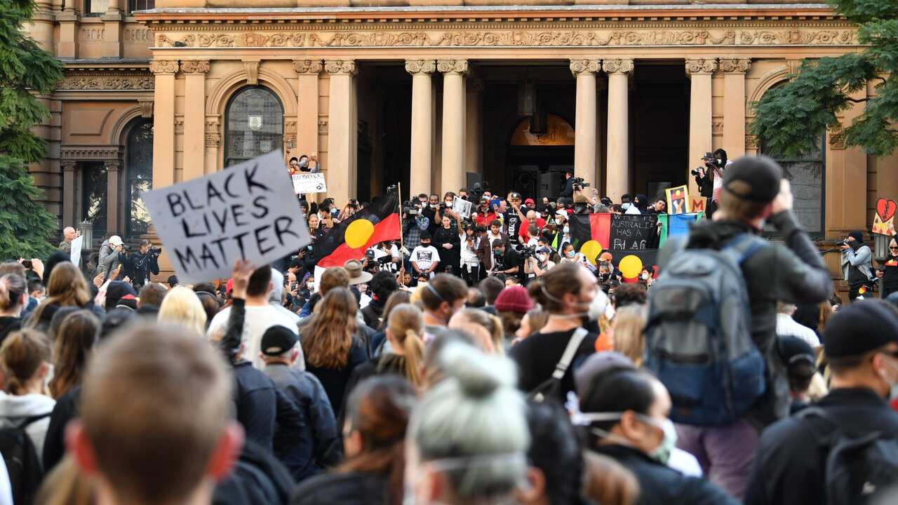 Protesters participate in a Black Lives Matter rally in Sydney