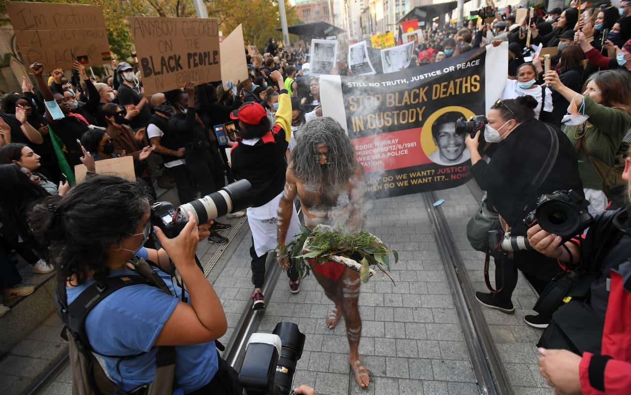 Protesters participate in a Black Lives Matter rally in Sydney