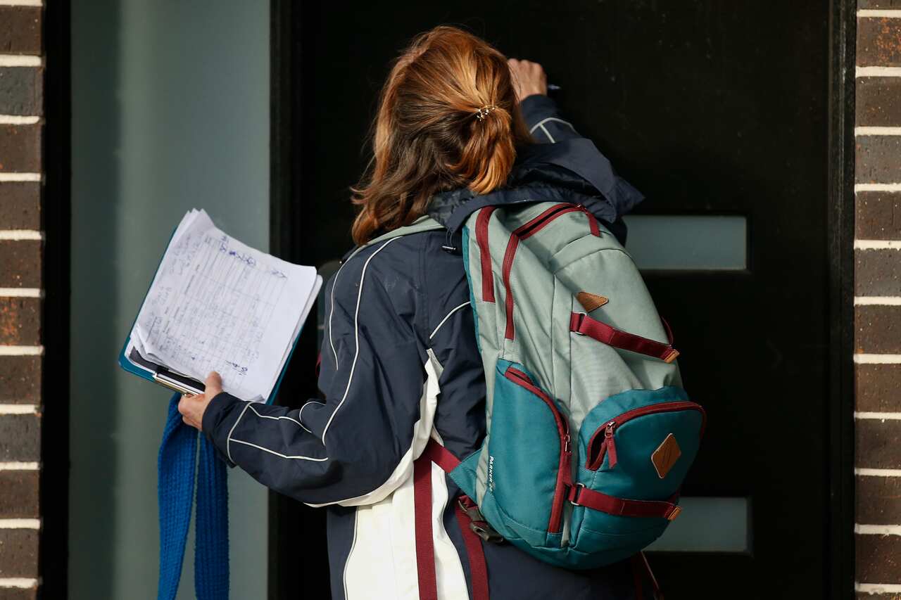 Victoria State Government Health and Human Services people knock on doors in Broadmeadows to check if people have any symptoms of COVID19 and would like a test, in Melbourne, Thursday, June 25, 2020. The ADF and other states have been called in to help Vi