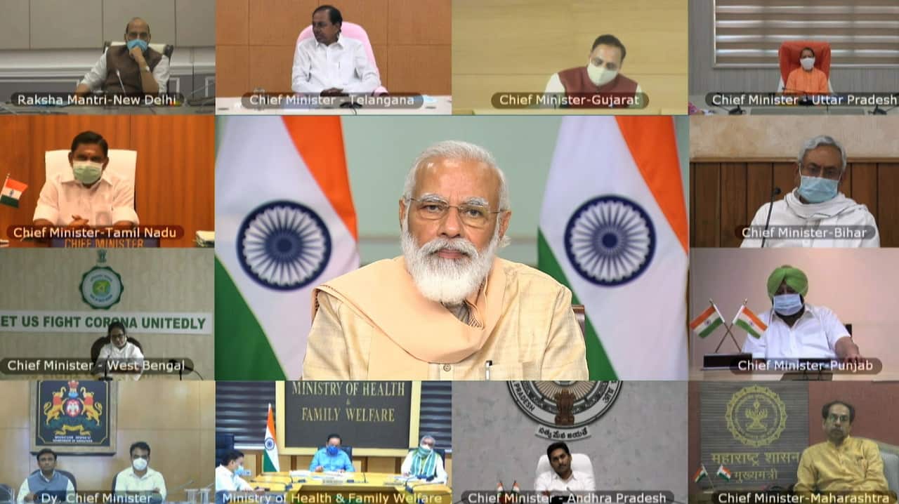 Indian PM Narendra Modi (C), with the Chief Ministers of Indian states discussing the COVID-19 pandemic through video conferencing, New Delhi 11 August 2020. 