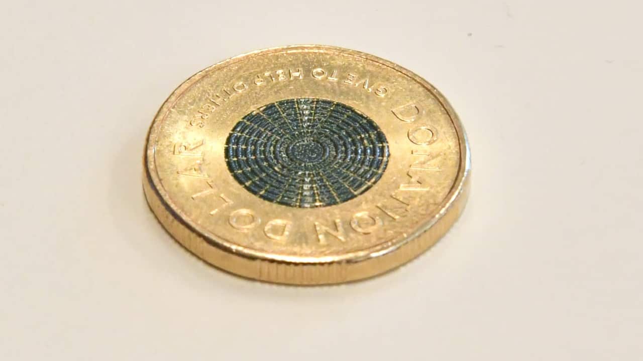 The new donation coin at the launch of the Royal Australian Mint’s new Donation Dollar in Canberra, Wednesday, September 2, 2020. 