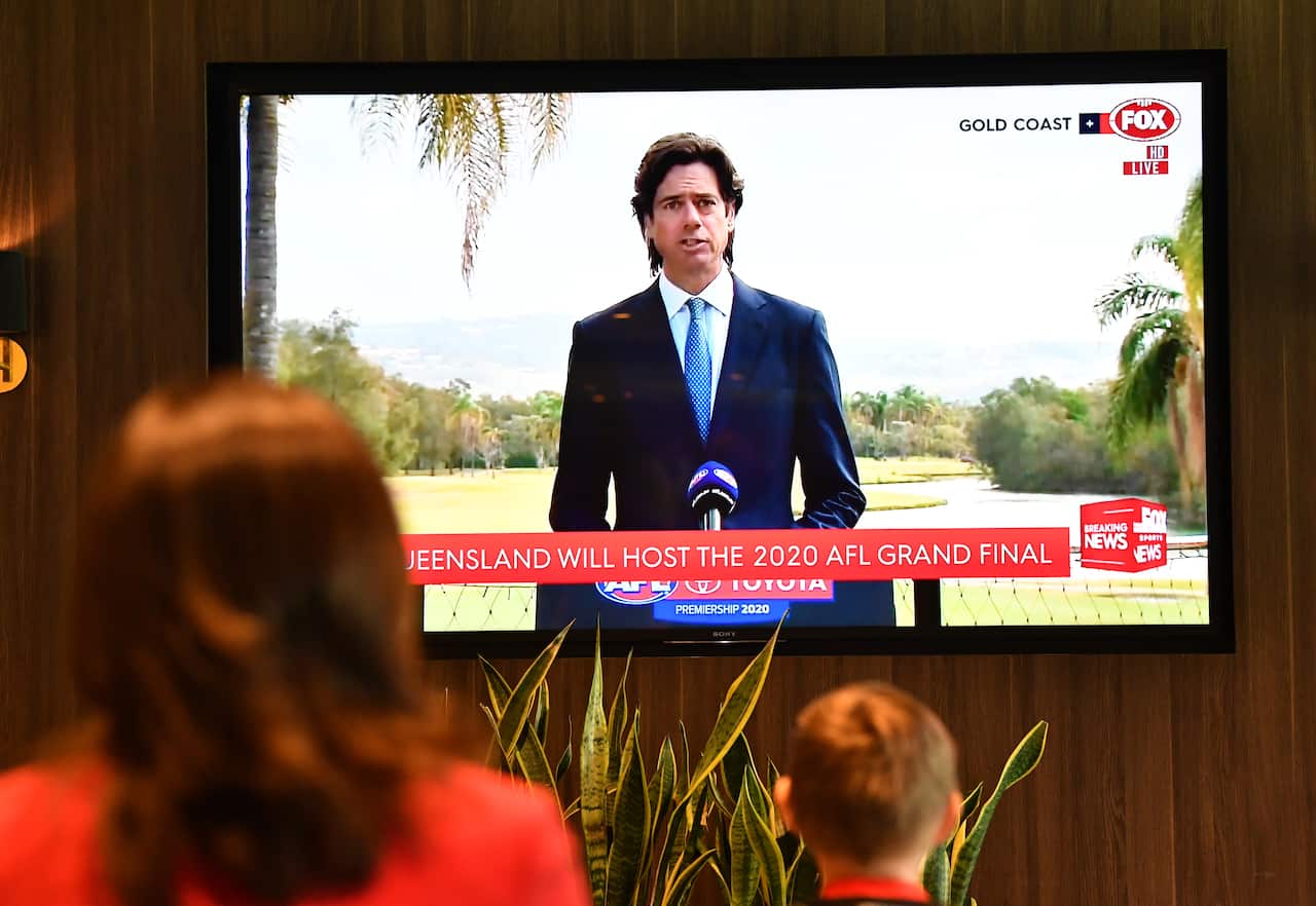 AFL CEO Gillon McLachlan is seen on a TV screen at the announcement that Brisbane will host the AFL Grand Final during a press conference at the Gabba in Brisbane, Wednesday, September 2, 2020. The AFL have announced that the Gabba will host the Grand Fin