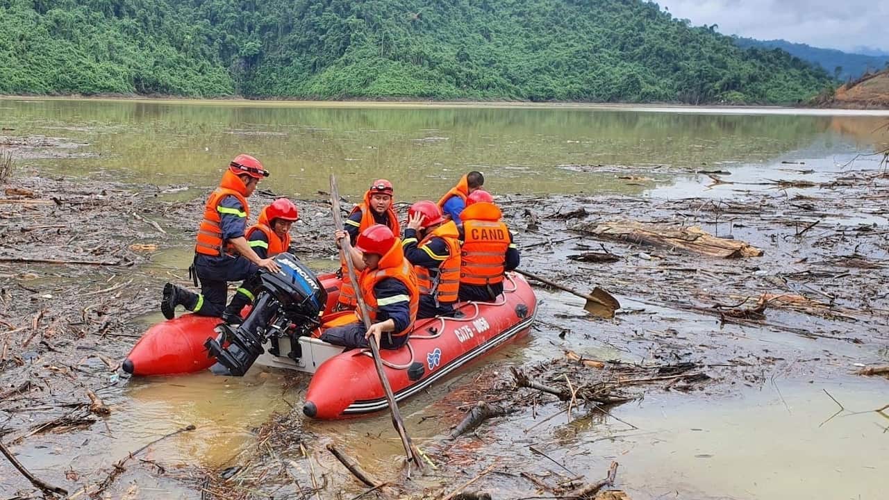 Vietnamese search and rescue personnel during an operation searching for missing people after landslides at a hydropower dam, in Hue, Vietnam.