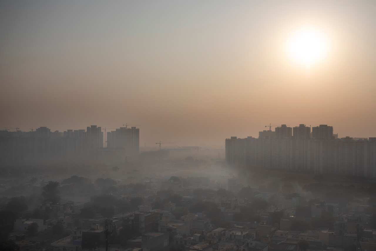 Morning haze envelops the skyline on the outskirts of New Delhi, India, Friday, Oct. 16, 2020.