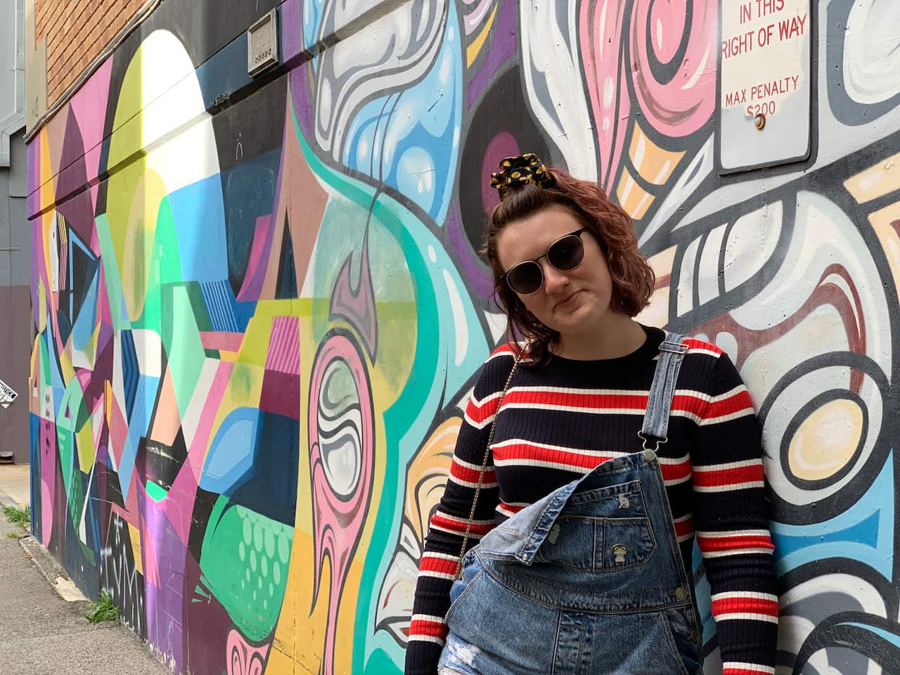 A supplied undated image obtained Thursday, November 19, 2020 shows Saxon Mullins posing for a photo. More than two years after Saxon Mullins told the story of her alleged rape as an 18-year-old virgin in a Sydney alleyway, a review of NSWs consent laws h