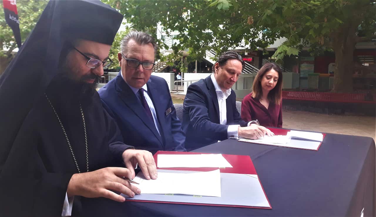 Father Evmenios Vasilopoulos, John Dewar, Bill Papastergiadis, Kat Theophanous. 