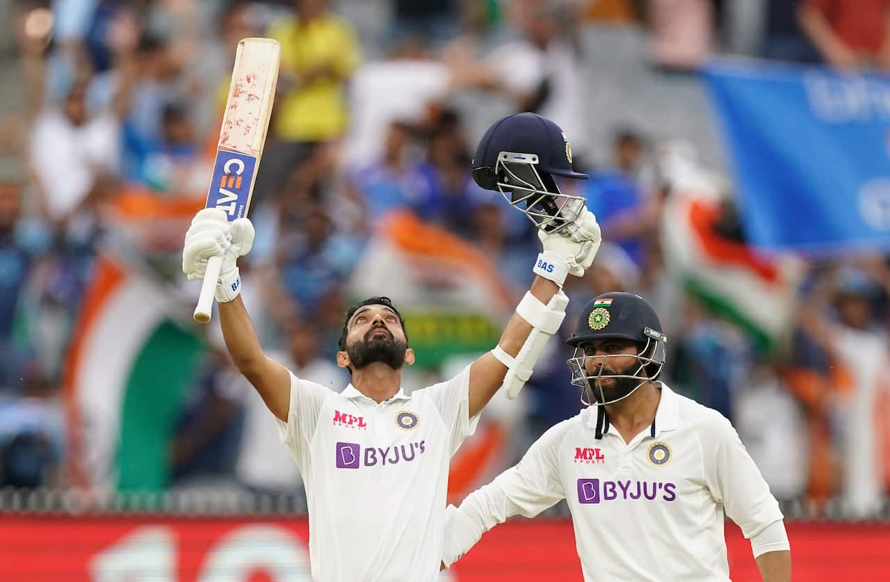 Ajinkya Rahane of India celebrates after reaching his century