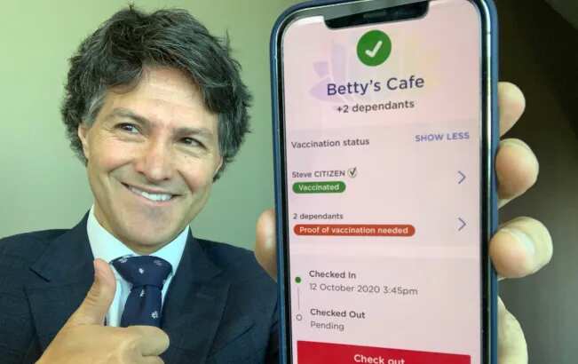 NSW Customer Service Minister Victor Dominello with the proof of vaccination feature in the Service NSW app.