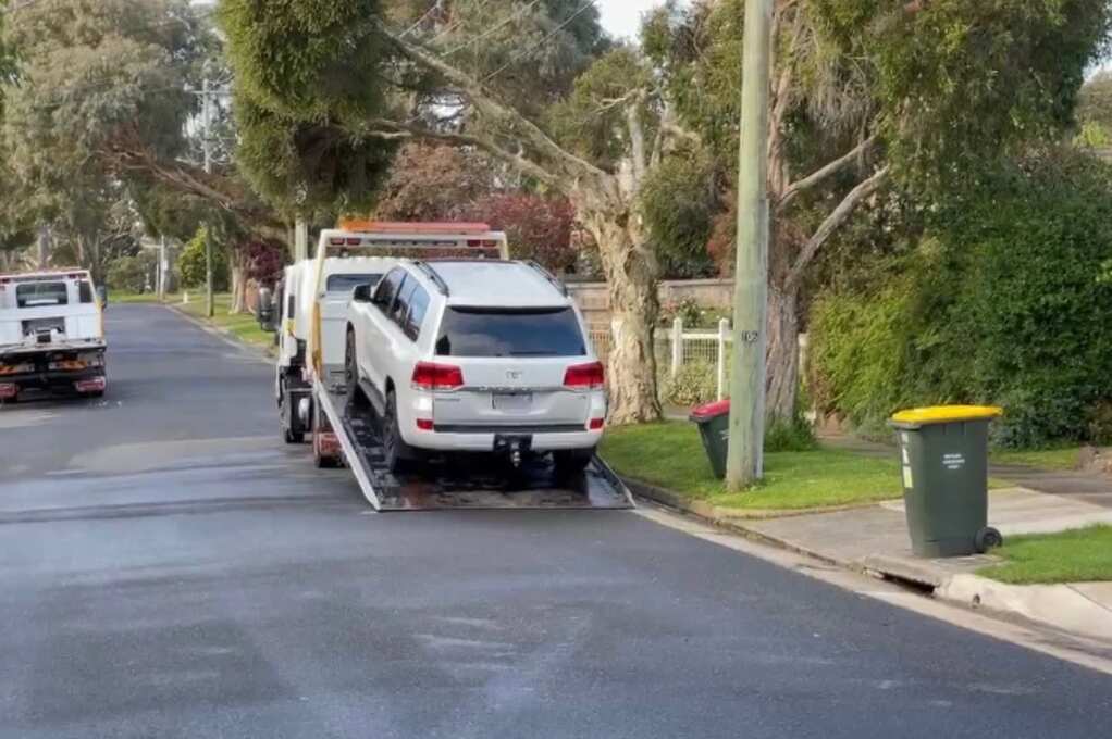 Luxury vehicles were also seized during the raids.CREDIT: