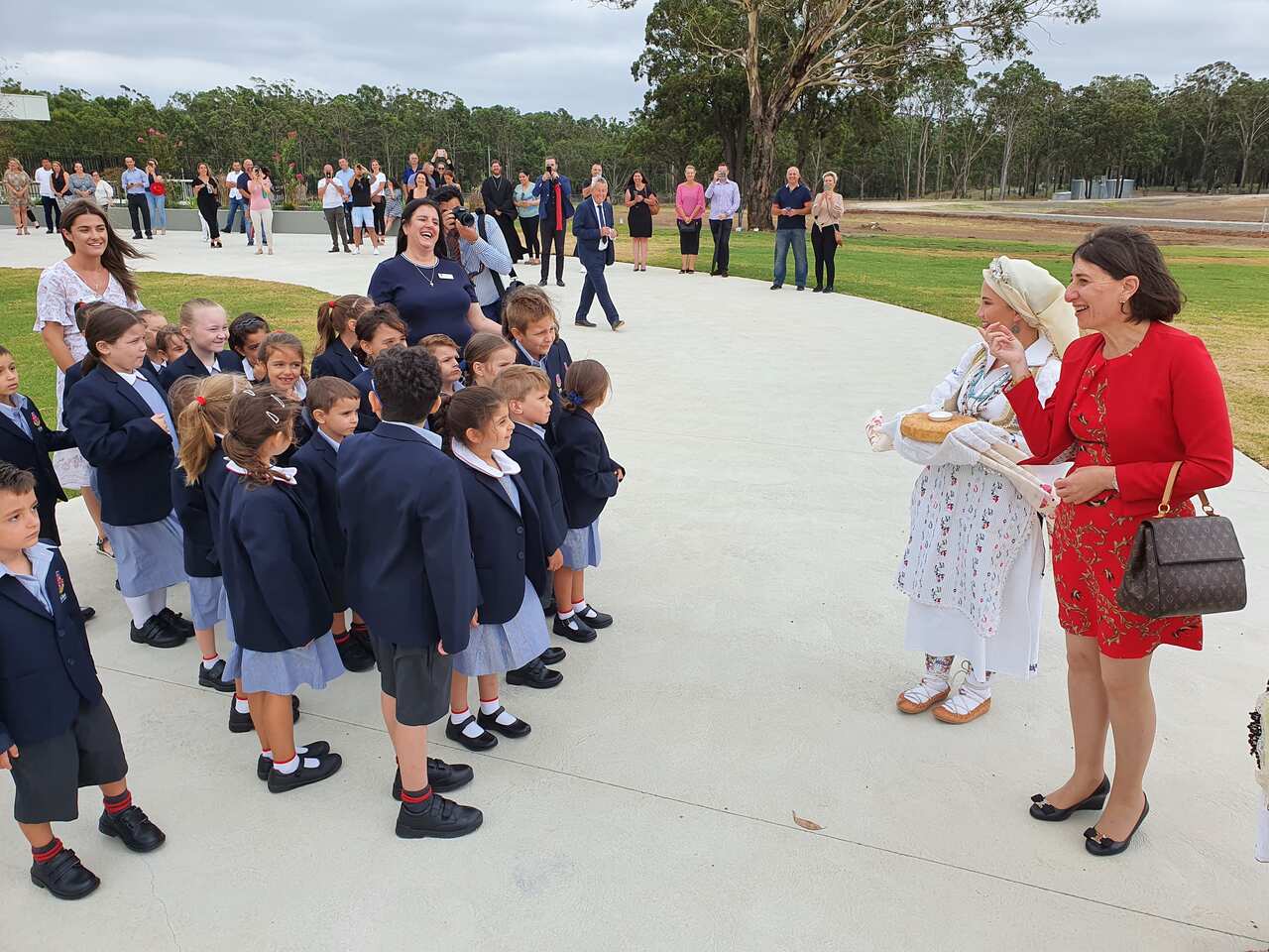 The St Sava College was officially opened by Premier Gladys Berejiklian who later joined students together with the Bishop Siluan and posed for the photo.
