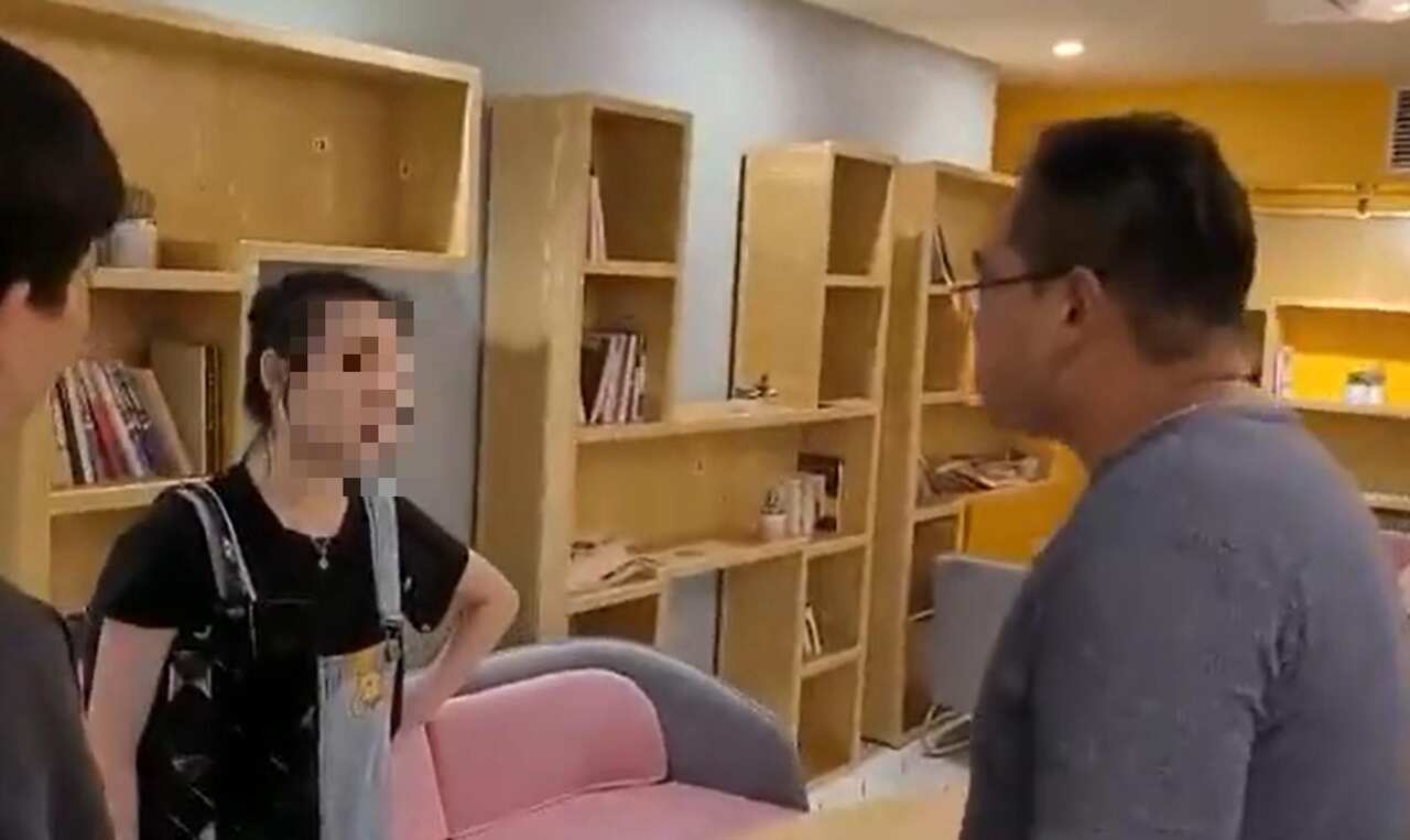 A woman was slapped and kicked by a man over a purported pay dispute at an Adelaide dessert shop