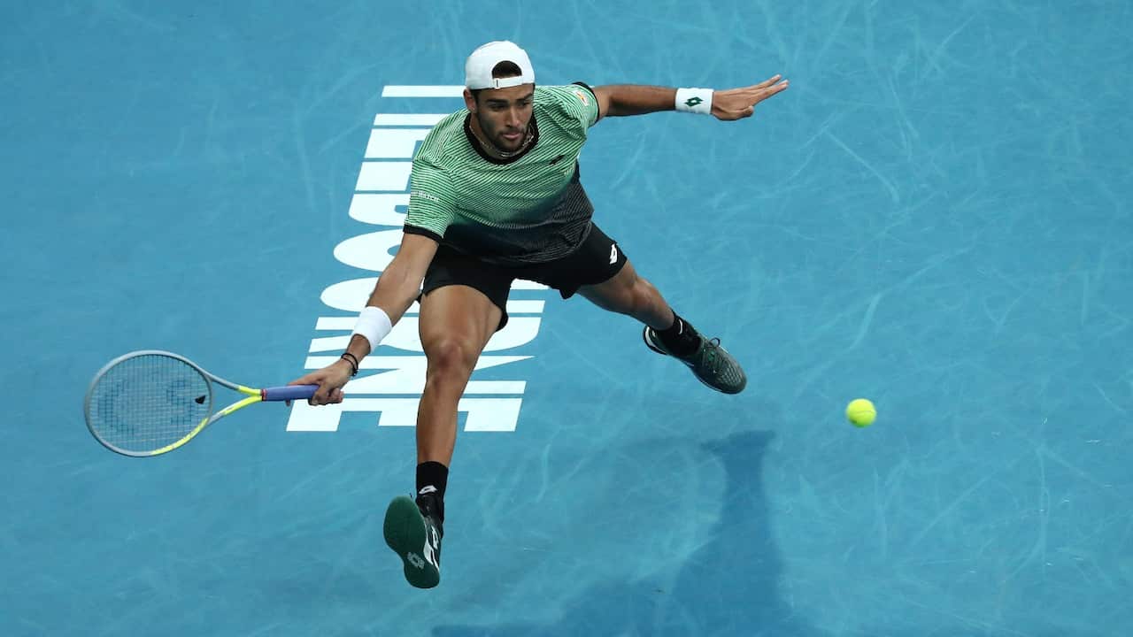 Matteo Berrettini of Italy hits a return to Karen Khachanov of Russia during their third round match at the Australian Open, Melbourne.