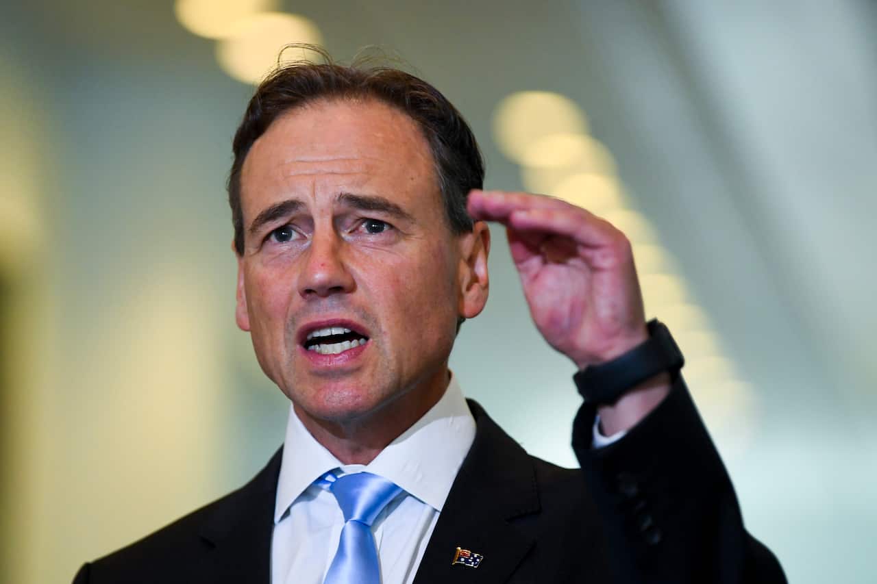 Australian Health Minister Greg Hunt speaks to the media during a press conference at Parliament House in Canberra, Tuesday, February 23, 2021. (AAP Image/Lukas Coch) NO ARCHIVING