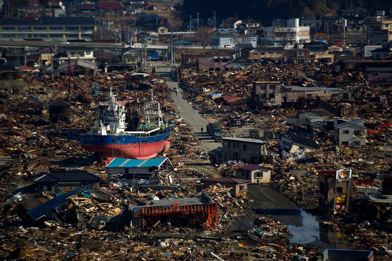 In this March 28, 2011, file photo, a ship sits in a destroyed residential neighborhood in Kesennuma, Miyagi Prefecture, northeastern Japan, after a powerful tsunami hit the area on March 11. (AP Photo/David Guttenfelder, File)