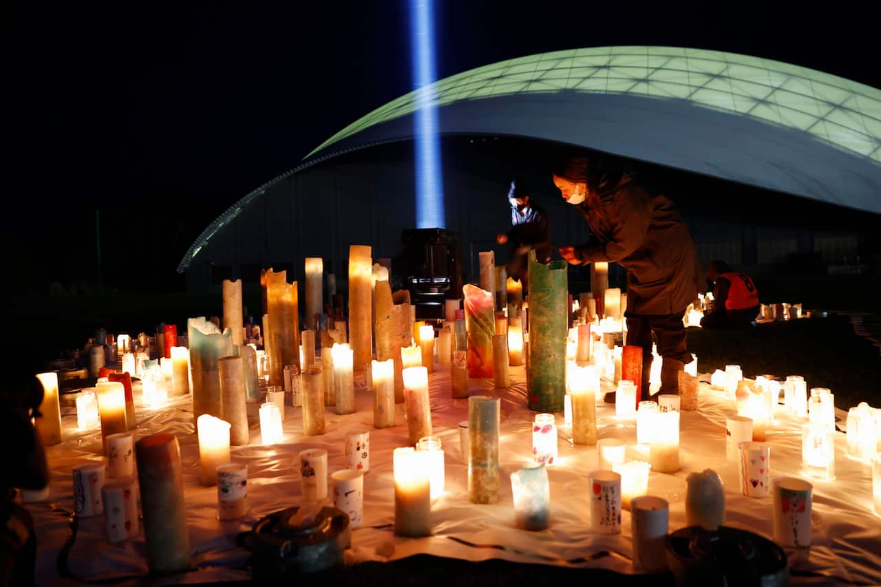 Candles are lit at the J-Village soccer training centerin Fukushima Prefecture on March 10, 2021.