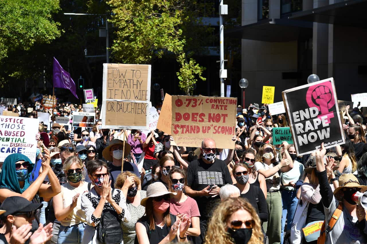 Thousands gather during the Women's March 4 Justice in Sydney, Monday, March 15, 2021. Marches are being held around the country to raise awareness of sexual harassment against women in government and workplaces. (AAP Image/Dean Lewins) NO ARCHIVING