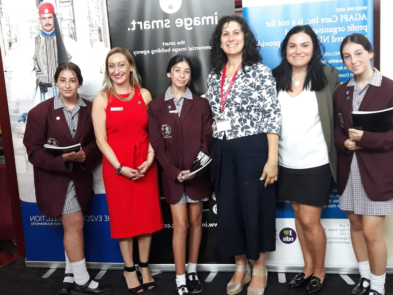 Educator Natasha Spanos (2nd from left), with colleagues and students, at the evoznes exhibition opening hosted by Melbourne's Oakleigh Grammar. 