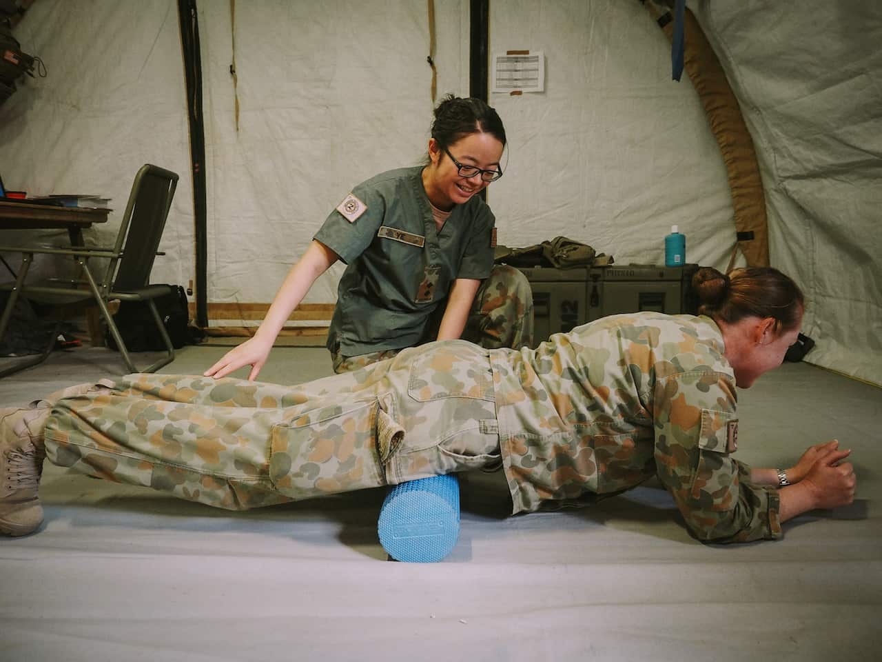  Talisman Sabre (TS); Australian Army Physiotherapist Captain (then Lieutenant) Xiaobei Ye treats a colleague during Exercise Talisman Sabre 2017.
