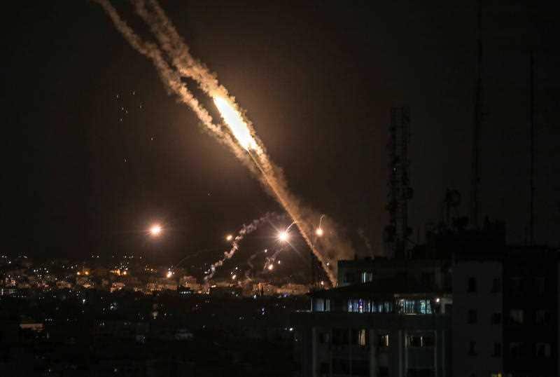  Rockets fired from Gaza fly towards Israel, as seen from Gaza City, late 13 May 2021. In response to days of violent confrontations between Israeli security forces and Palestinians in Jerusalem, various Palestinian militants factions in Gaza launched roc
