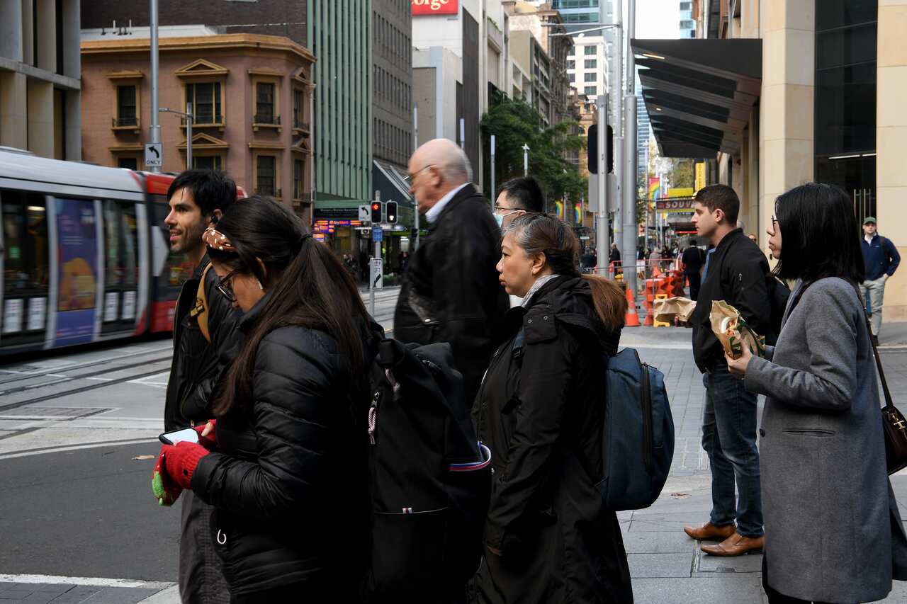 People are seen in the central business district (CBD) of Sydney, Thursday, May 20, 2021. Australia's unemployment rate fell 0.2 per cent in April 2021 to 5.5% per cent. (AAP Image/Bianca De March) NO ARCHIVING