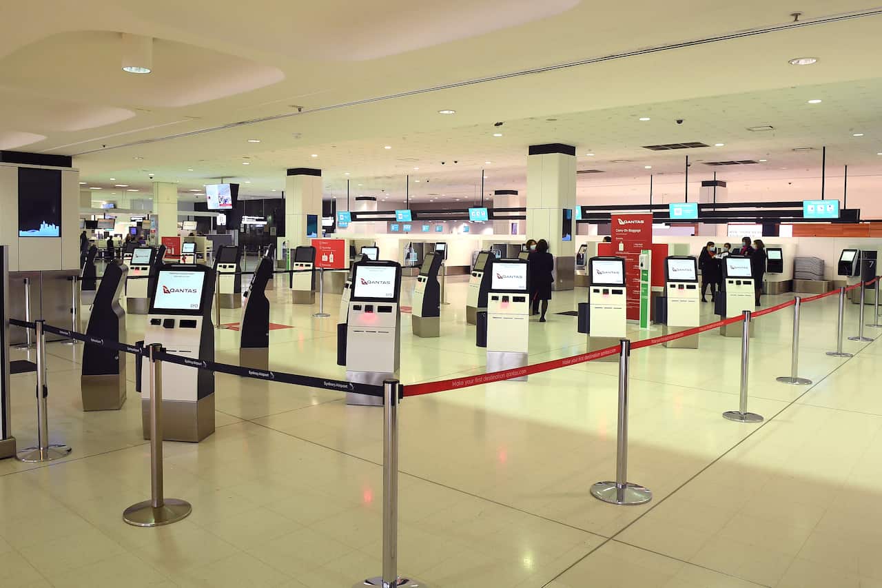 The Qantas check in counter is seen at Sydney International Airport, in Sydney, Wednesday, June 23, 2021. 