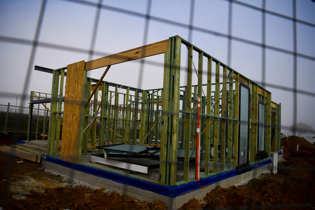 Timber framing is seen on a construction site