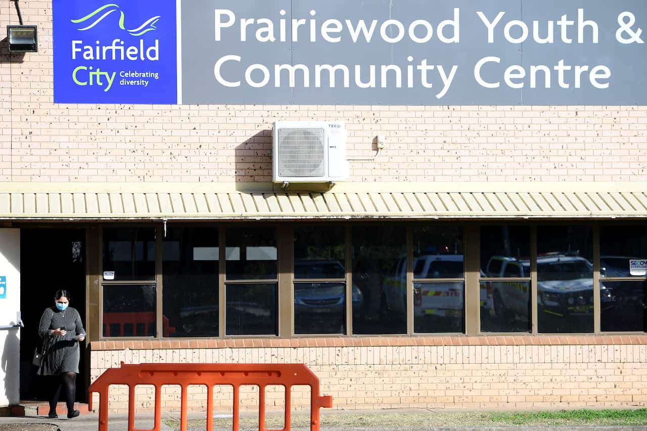 Teachers and education staff are seen at a mass vaccination hub located at Prairiewood Youth and Community Centre, in Sydney, Friday, July 16, 2021. (AAP Image/Dan Himbrechts) NO ARCHIVING