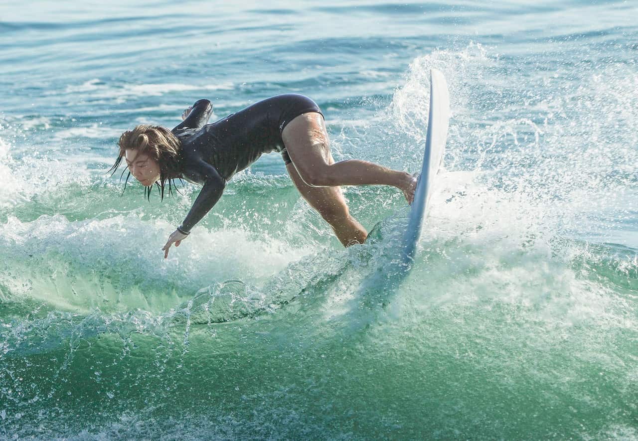 Japanese surfer Amuro Tsuzuki practices at Tsurigasaki Surfing Beach in the Chiba Prefecture town of Ichinomiya on July 20, 2021, ahead of the Tokyo Olympics starting later in the week.