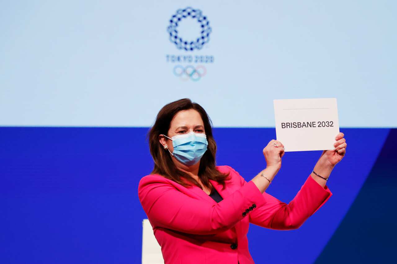 The Honourable Annastacia Palaszczuk MP, celebrates after Brisbane was announced as the 2032 Summer Olympics host city during the IOC Session at Hotel Okura in Tokyo, Wednesday, July 21, 2021. (Toru Hanai/Pool Photo via AP)