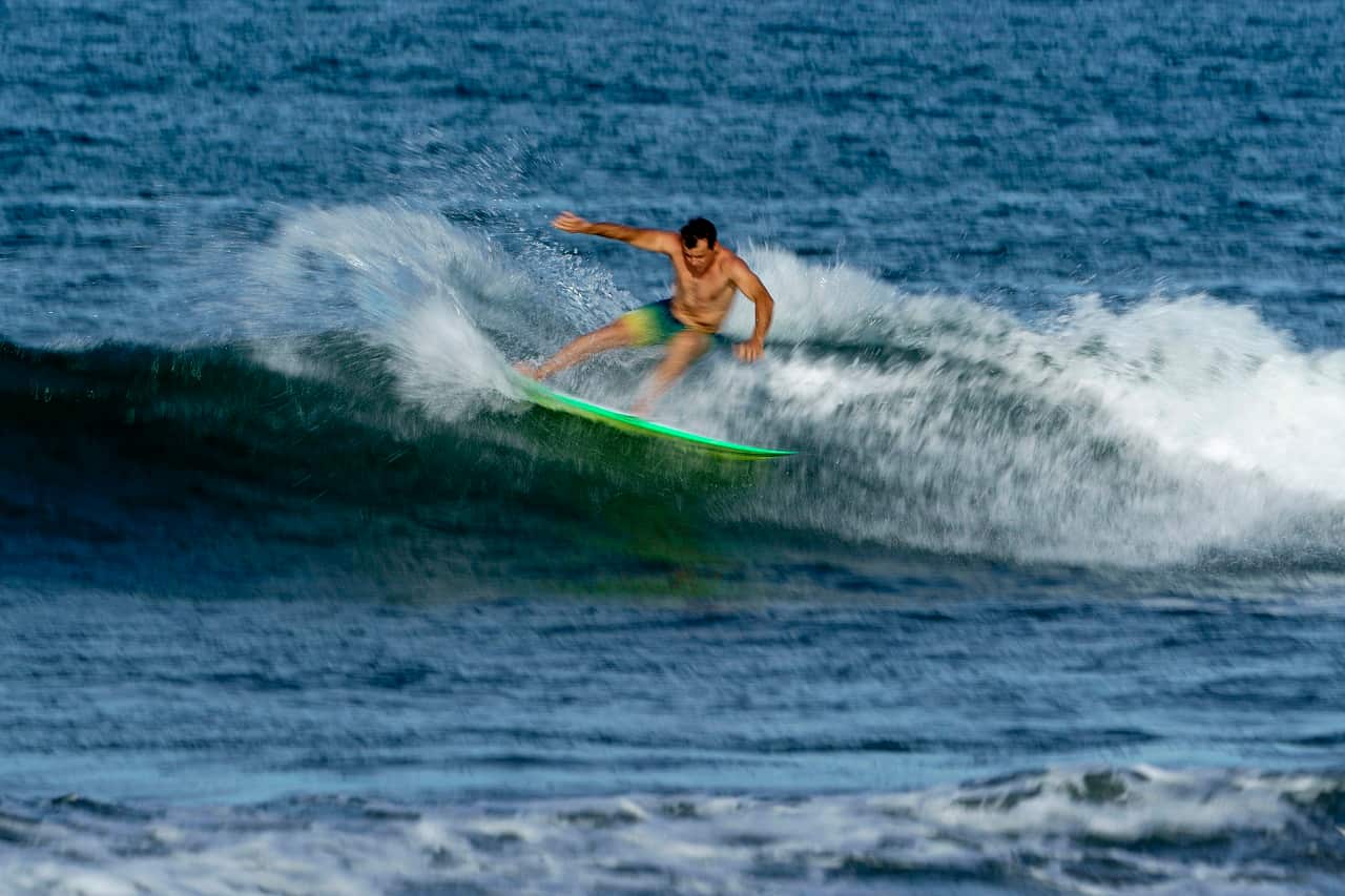 Surfer Julian Wilson, of Australia, rides a wave during a practice session at Tsurigasaki beach at the Tokyo 2020 Olympics in Ichinomiya, Japan, Wednesday, July 21, 2021. (AP Photo/David Goldman)