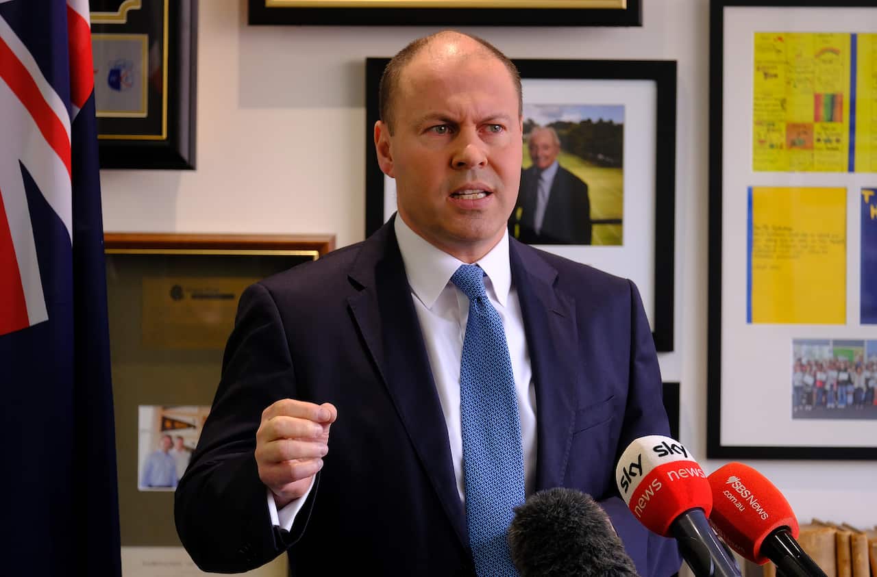 Australian Treasurer Josh Frydenberg speaks to the media during a press conference in Melbourne on Monday, July 26, 2021. (AAP Image/Luis Ascui) NO ARCHIVING