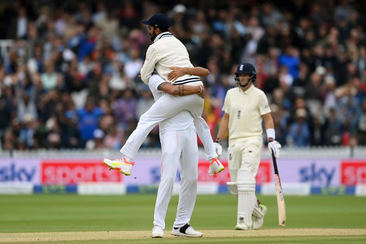 India's Ishant Sharma and KL Rahul celebrate the dismissal of England's Haseeb Hameed 