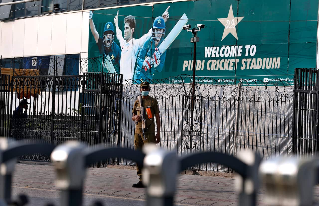 A police officer stands guard outside the Pindi Cricket Stadium following cancelket tour of Pakistan over security concerns that mystified the hosts, just before the Black Caps' first scheduled match in Pakistan in 18 years. 