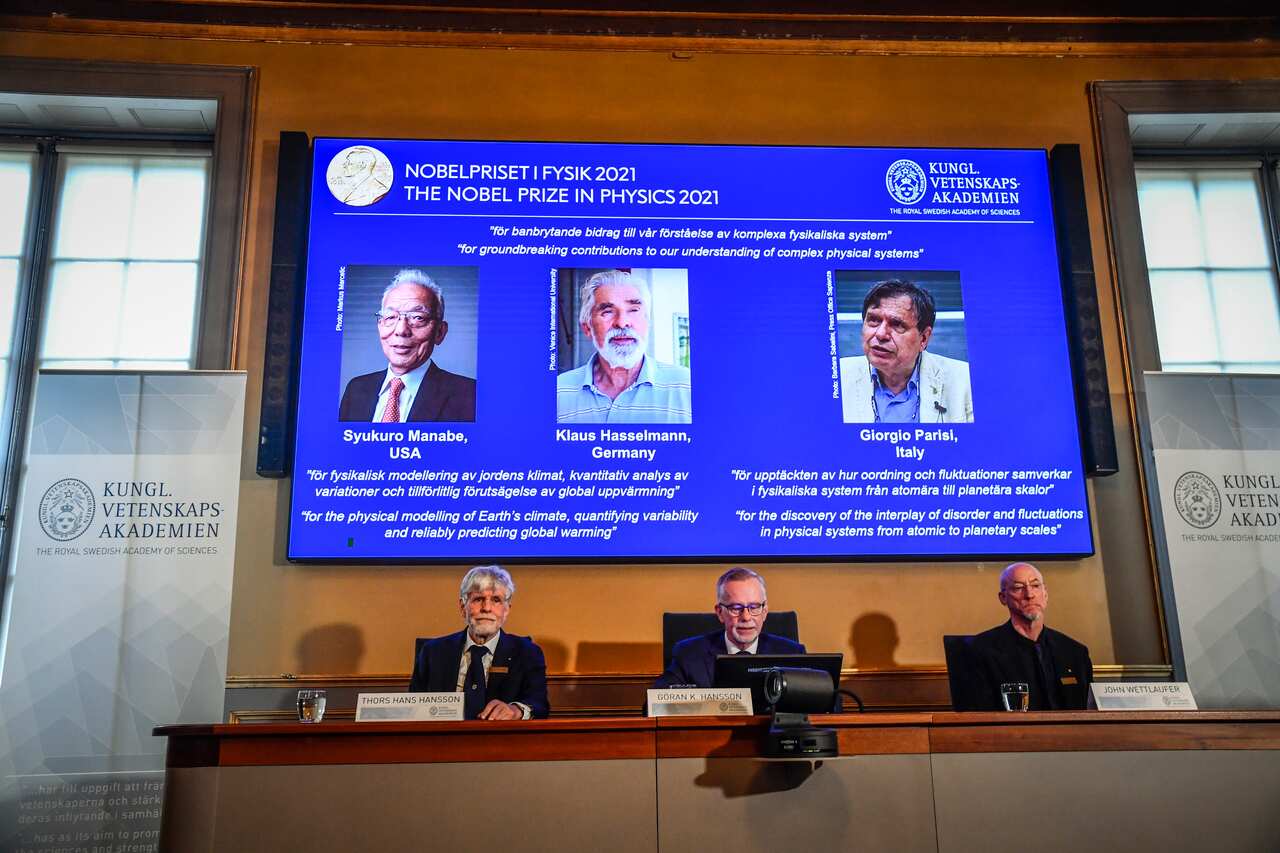 epa09506747 (L-R) Member of the Nobel Committee for Physics Thors Hans Hansson, Goran K. Hansson, Secretary General of the Royal Swedish Academy of Sciences, and Member of the Nobel Committee for Physics John Wettlaufer during the announcement of the winn