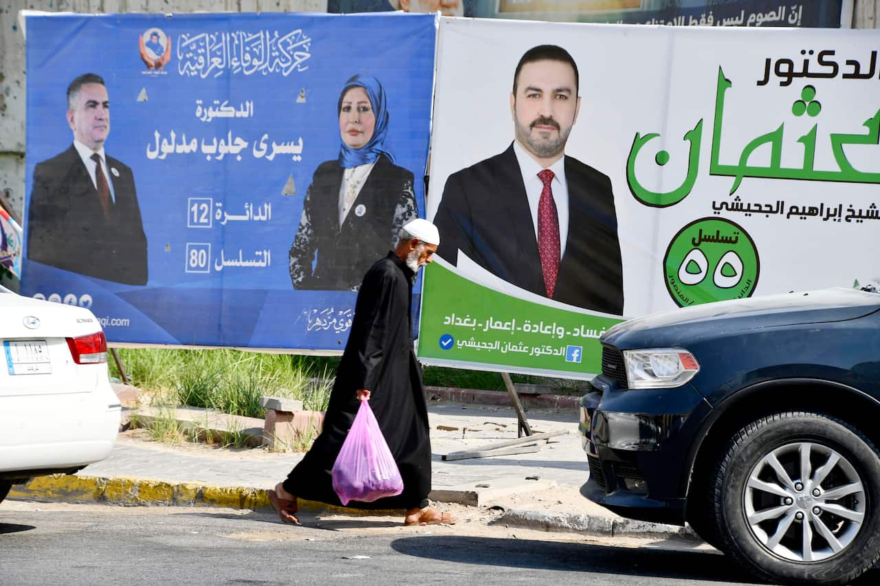 Election posters are seen on a street in Baghdad on Oct. 6, 2021, ahead of Iraq's parliamentary election. (Kyodo via AP Images) ==Kyodo