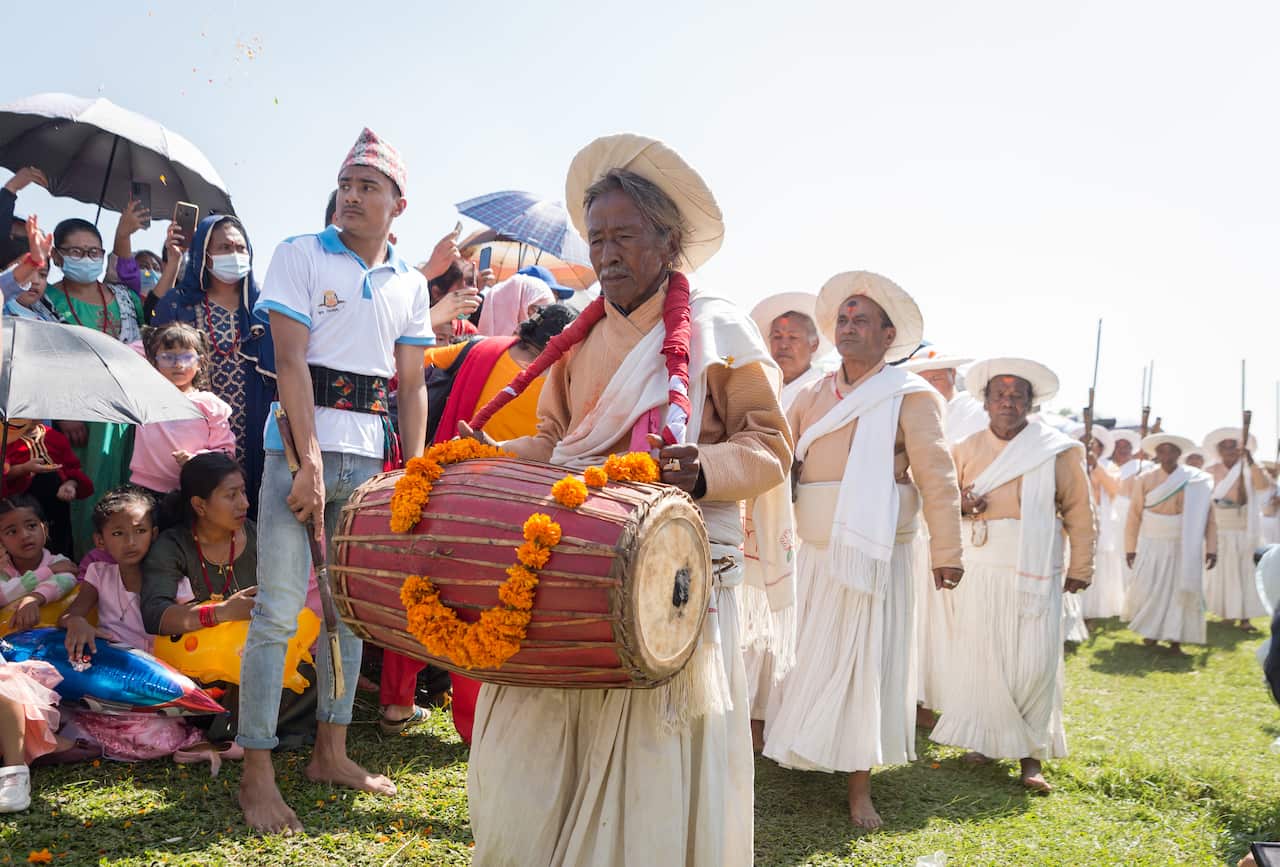 A Nepalese Hindu devotee plays a drum during the Sikali Jatra' festival.