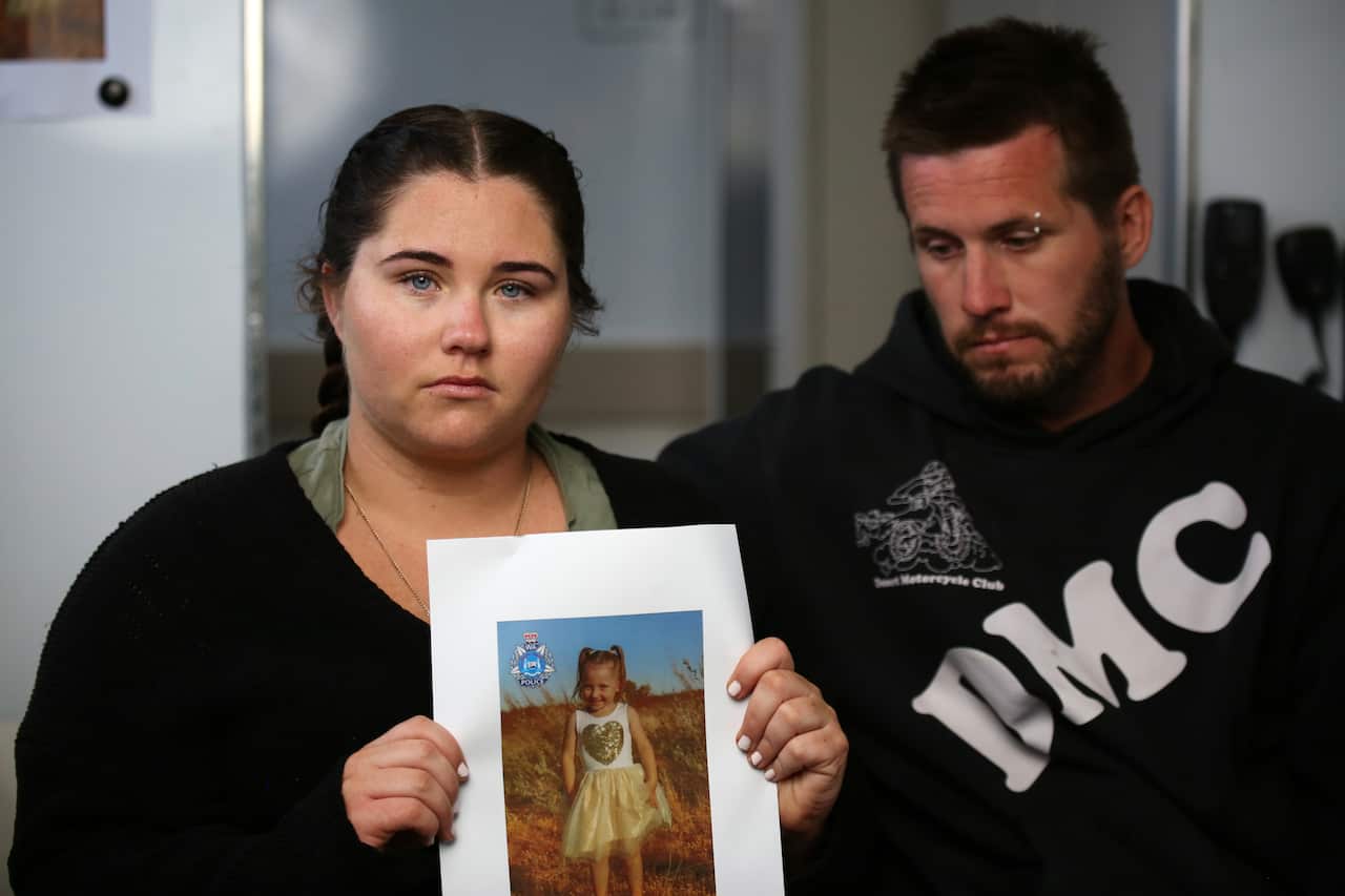 Cleo Smiths mother Ellie Smith and her partner Jake Gliddon, speak about her disappearance from a police truck at Blowholes campsite, outside Carnarvon in Western Australia, Tuesday, October 19, 2021. The search for missing four-year-old Cleo Smith in Wes