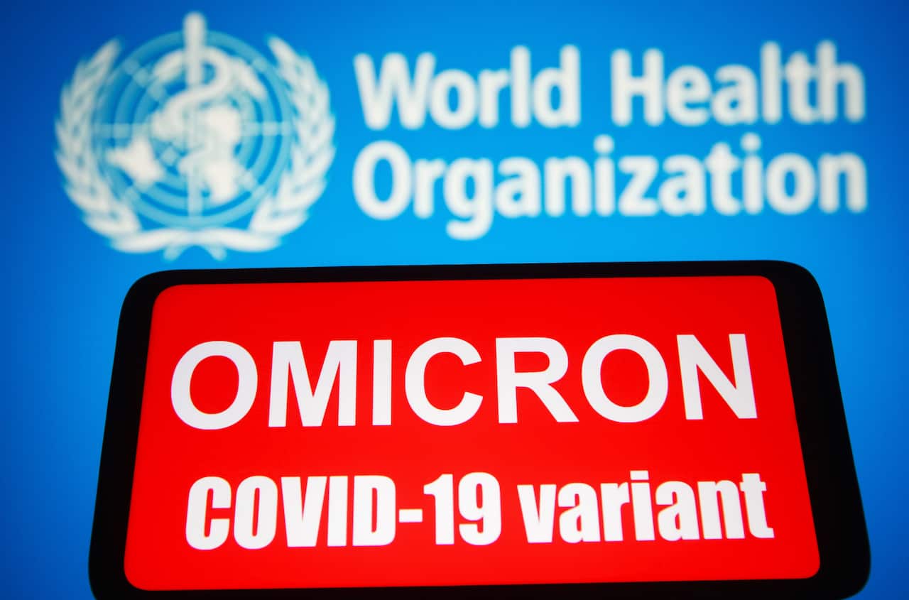 Words that say Omicron COVID-19 variant is seen on a mobile phone