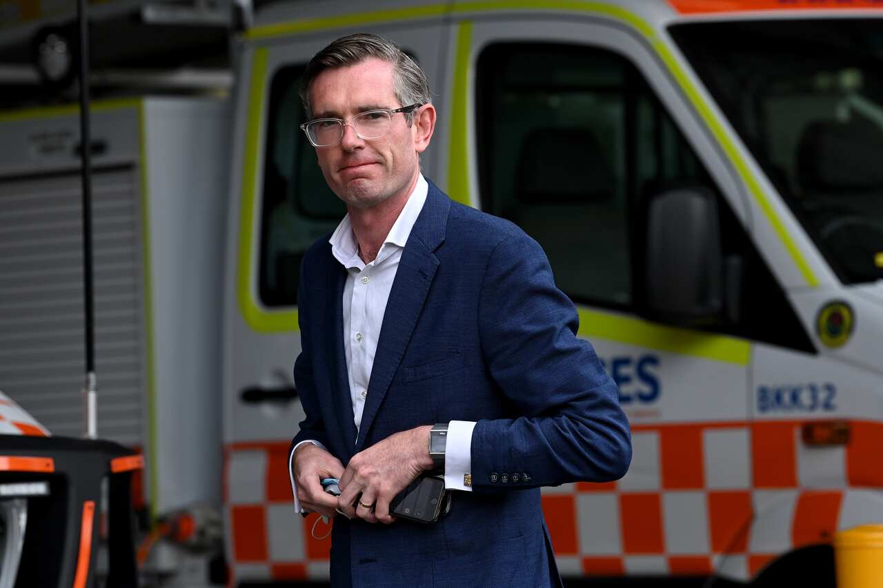 NSW Premier Dominic Perrottet arrives for a press conference at the Bass Hill Operations Centre in Sydney, Sunday, November 28, 2021. The Premier provide an update on COVID quarantine arrangements in NSW, was briefed on the states flood emergency and the 