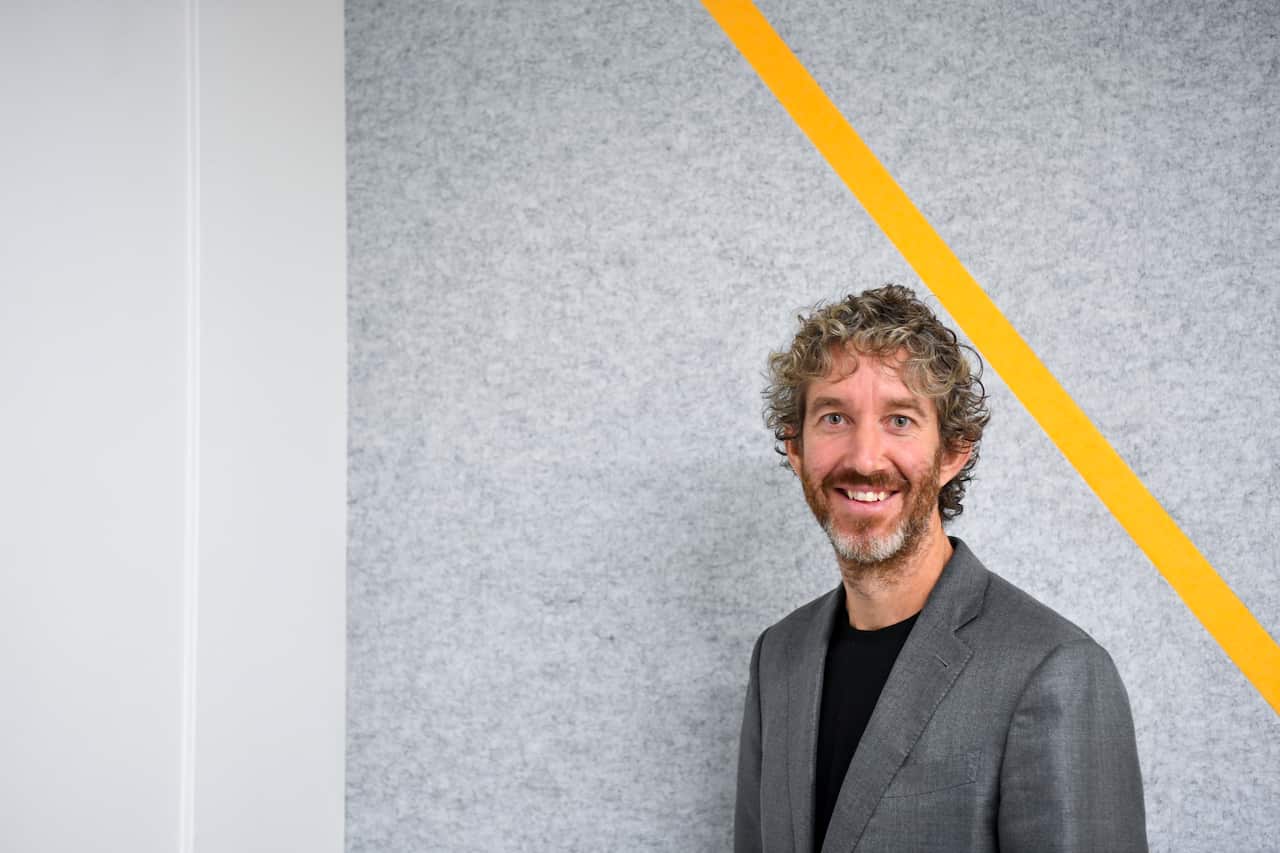 Atlassian Co-CEO Scott Farquhar poses for photographs during a partnership announcement between Tech Council of Australia and the Digital Skills Organisation (DSO) at the Tech Council of Australia, in Canberra, Tuesday, November 30, 2021. (AAP Image/Lukas