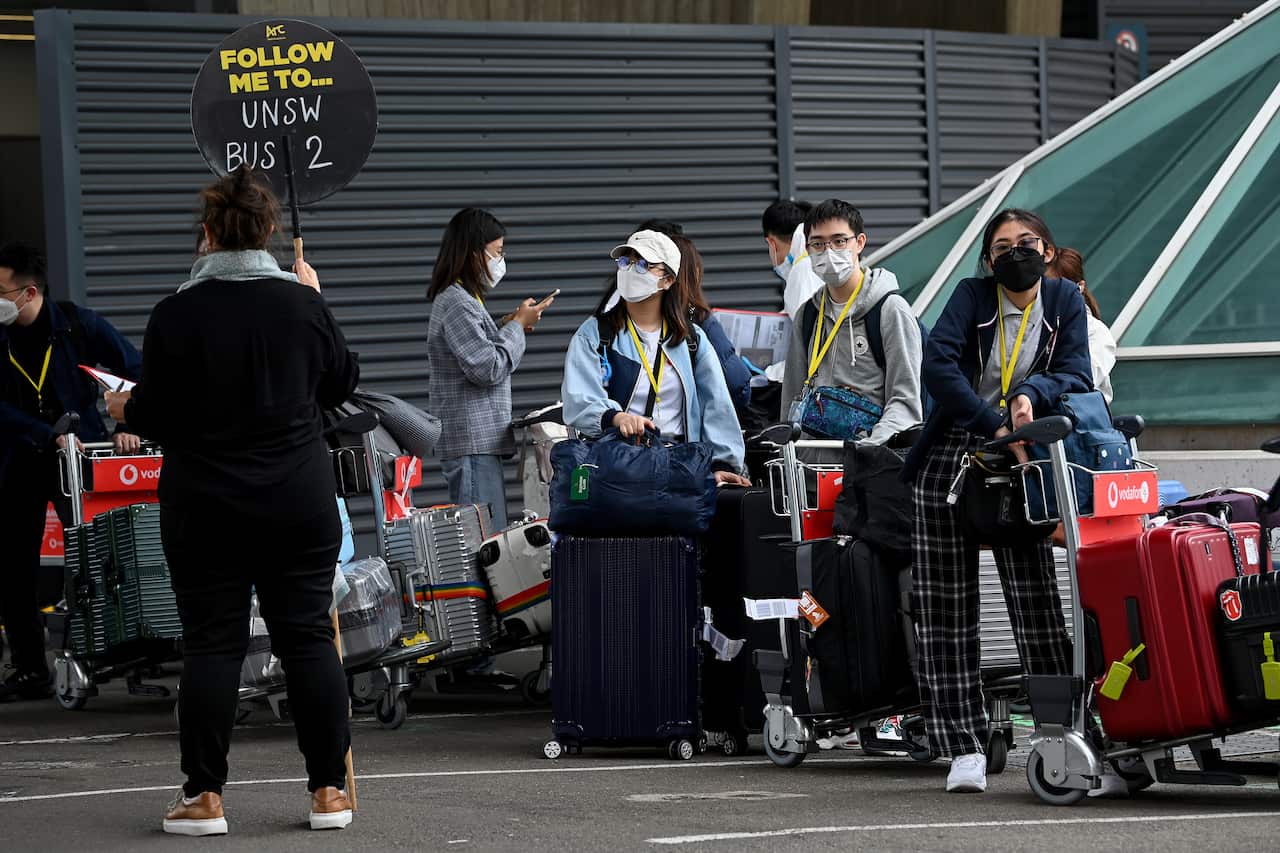 International students arriving at Sydney Airport on December 6 under pilot program to return international students to NSW.
