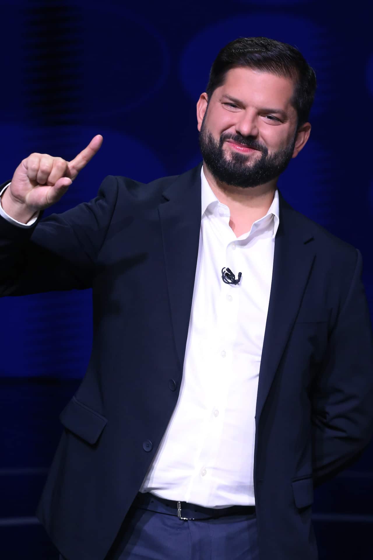 The candidate for the Broad Front, Gabriel Boric (L), participates in the presidential debate organized by the National Association of Television of Chile, in Santiago, Chile, 13 December 2021.  EPA/ELVIS GONZALEZ